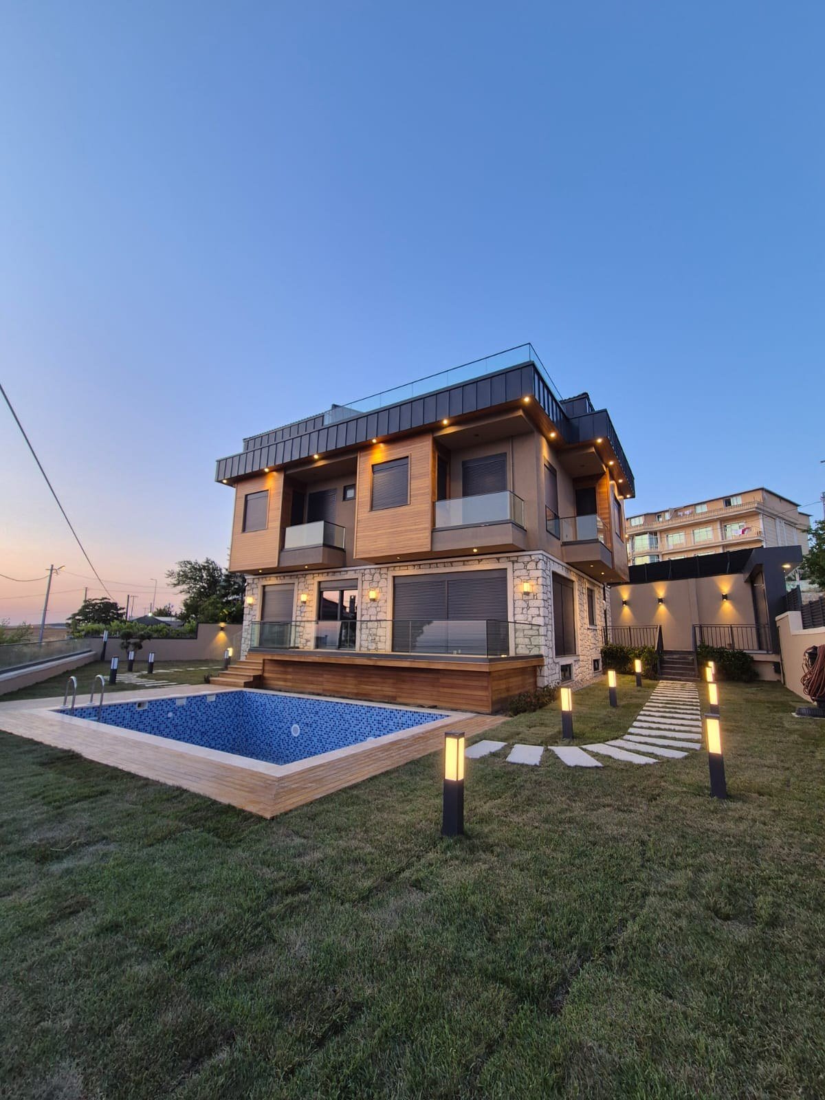 Marmara Haven Villa at dusk with its private pool