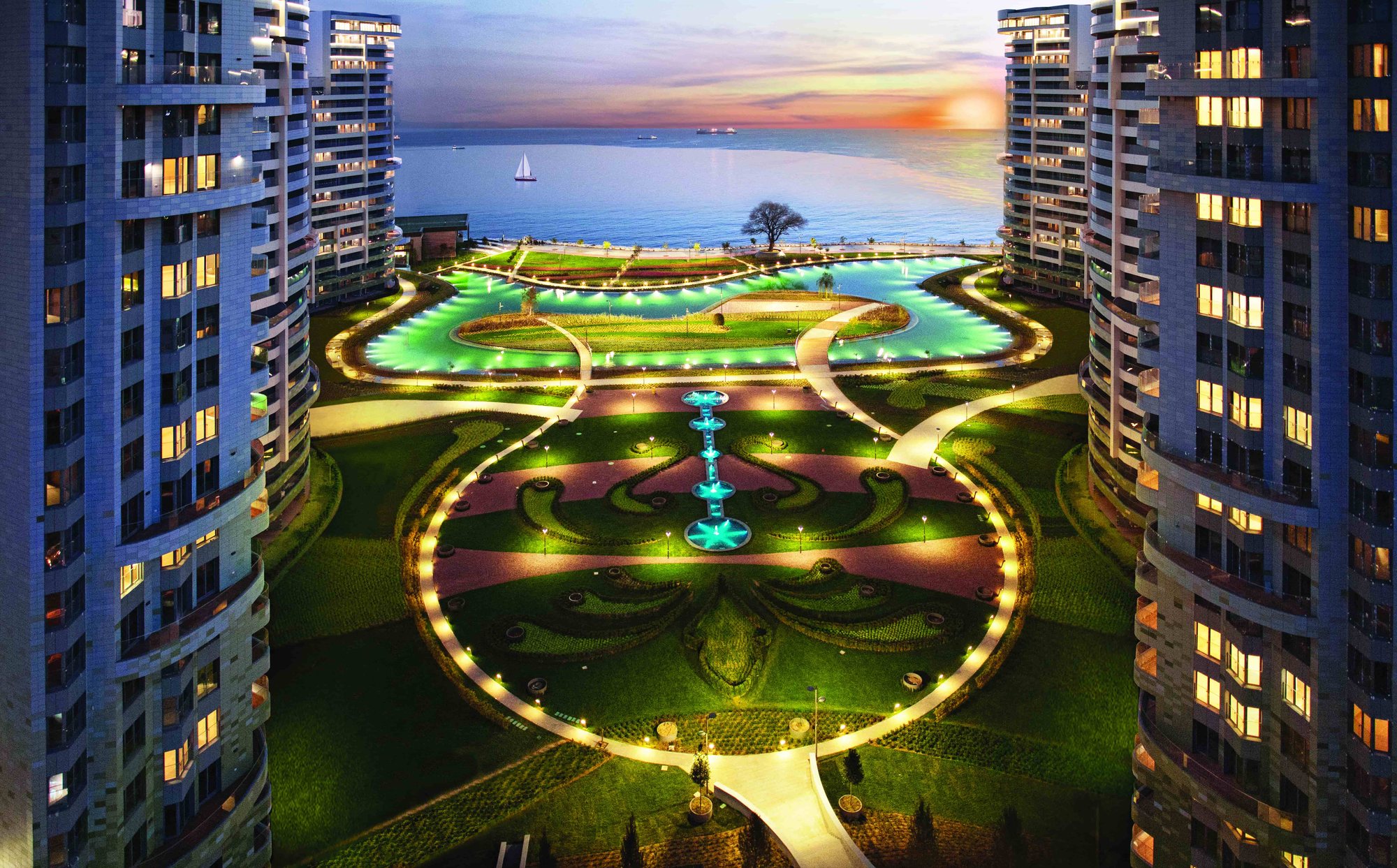 Sea Pearl Ataköy gardens and lagoon lit at night